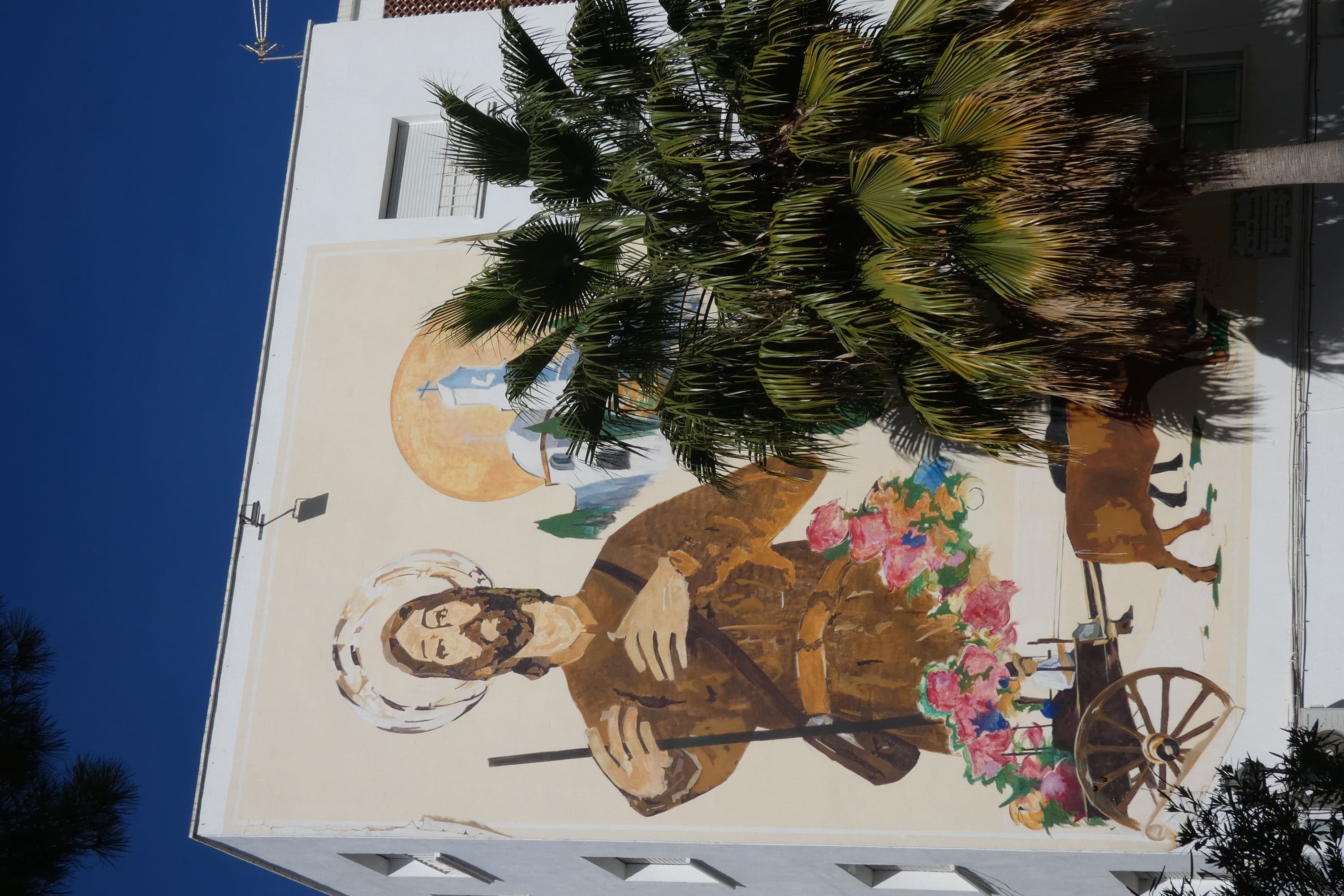Mural "San Isidro Labrador" de Blanca Larrauri en Estepona